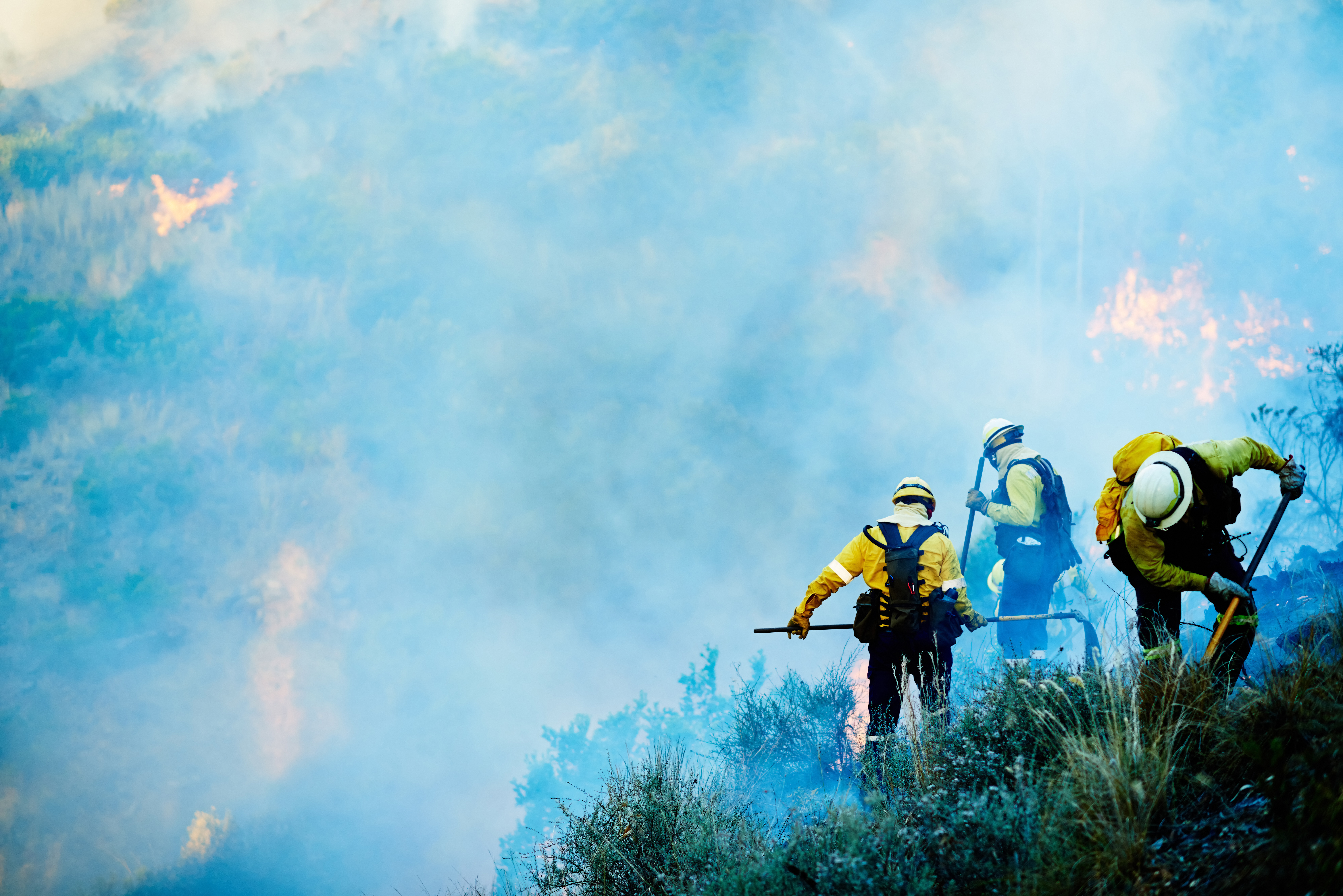 Wildland firefighters operating in smoke and terrain